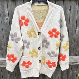 Super cute cardigan sweater with floral design!